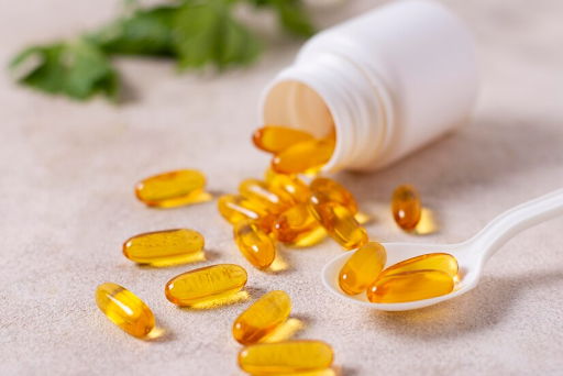 Vitamin D3 and K2 liquid capsules spilling from a bottle, highlighting their essential role in heart health, bone strength, and immune support.